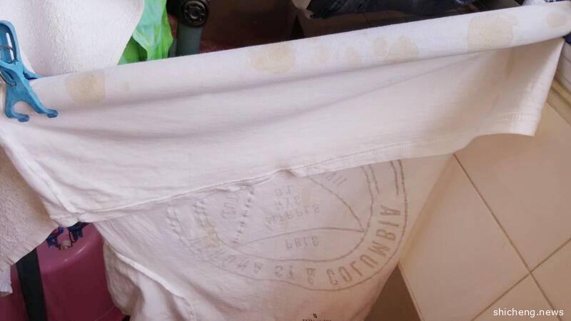 楼上恶邻泼尿 楼下衣服中招