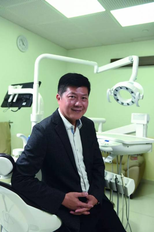 黄震宵 人生因齿美丽