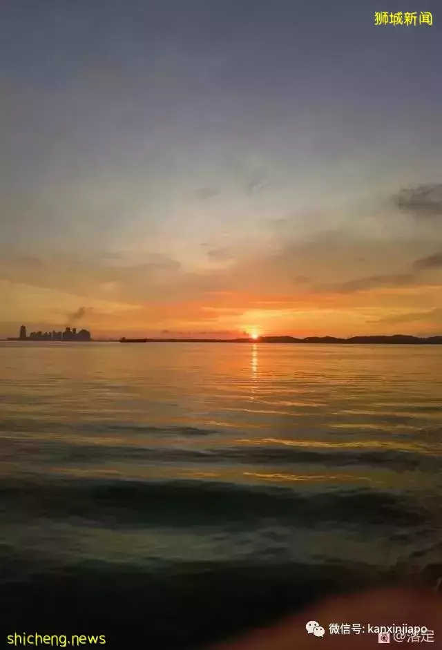 在新加坡看落霞云归，远眺柔佛海峡灯塔复明