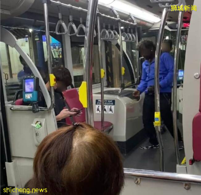 太特么嚣张啦!新加坡一“二B男”乘地铁不戴口罩,掏钱砸工作人员