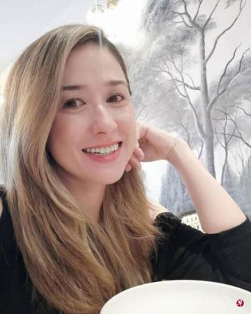 遭家暴离婚已14年 44岁傅爱妮享受单身