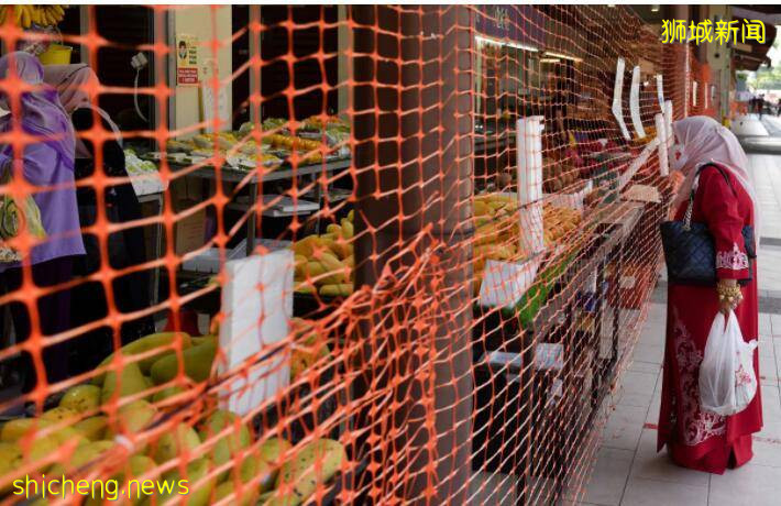 新加坡唐人街成“穿越火线”前线,大批“英雄”穿越疫区