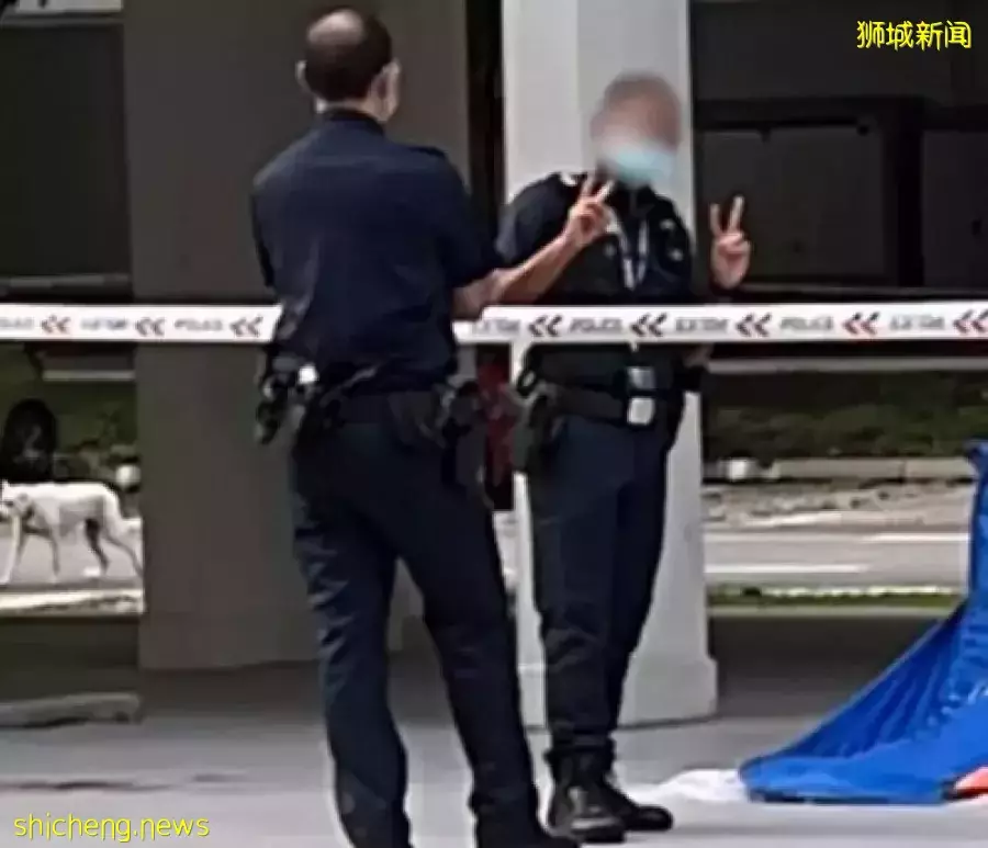 坠楼现场比胜利手势　新加坡一警员将面临处分