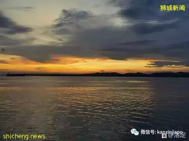 在新加坡看落霞云归，远眺柔佛海峡灯塔复明
