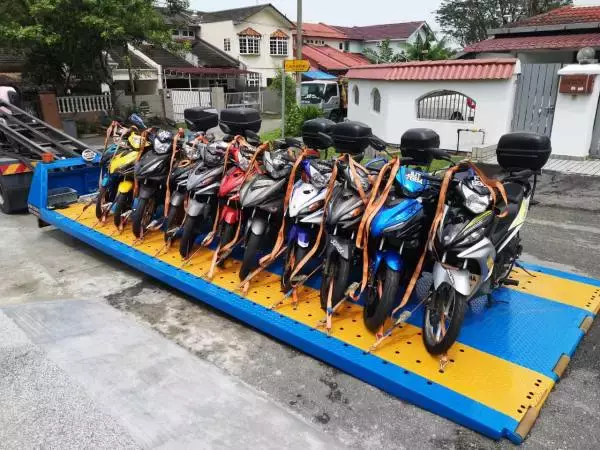 越堤族將代步工具運回國 新年拖車訂單 高達80%