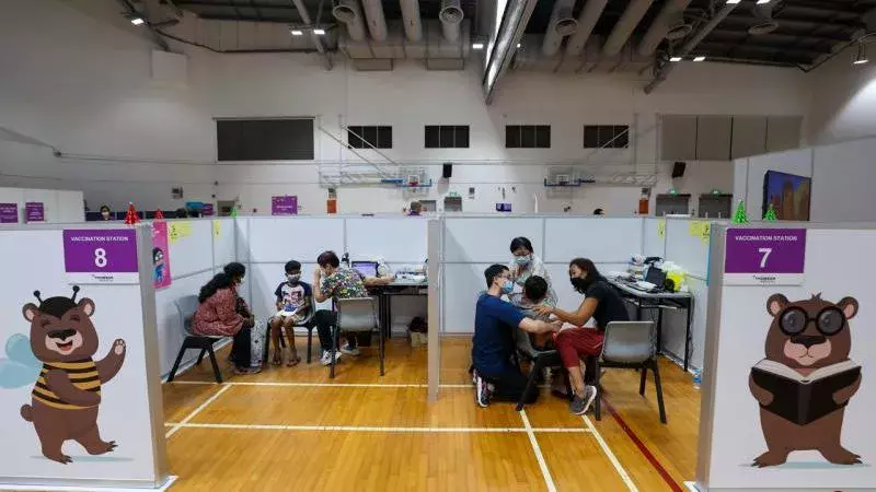 狮城完成接种与未满12岁患者 染疫隔离期10天缩至7天