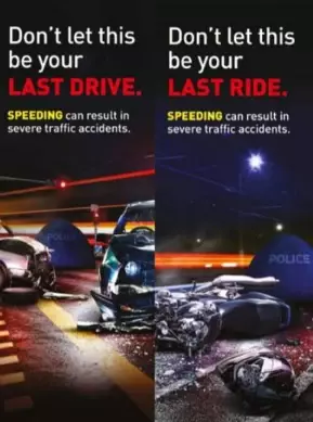 交警两款旗放灯柱 吁公众勿闯红灯不超速