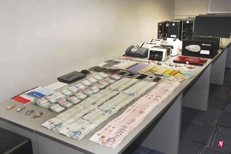 新加坡收注王 父子入狱共罚80万元