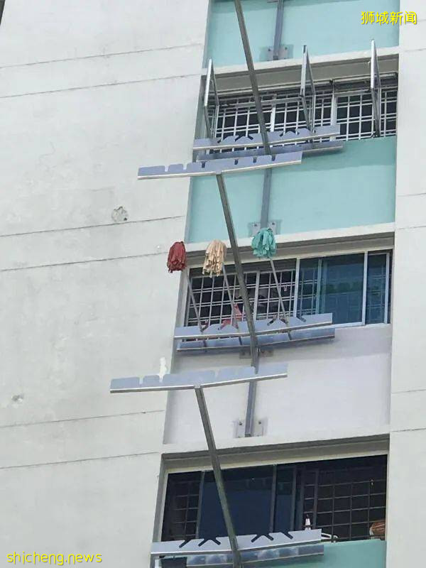 把拖把晒窗外 邻居贴字报“告状” 阿嫂报警称“遭恐吓”