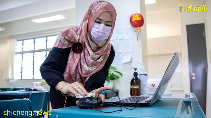 新加坡小六离校考试口试首日,政府加强防疫措施,学生须全程佩戴口罩