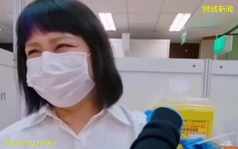 陈莉萍接种疫苗 紧张闭眼