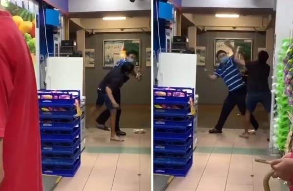 两个大男人超市外打架  遭批评行径幼稚