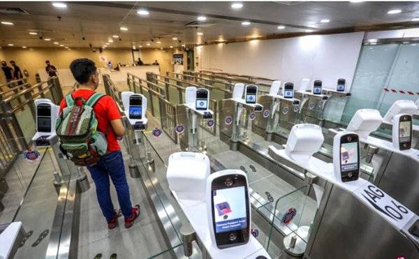 狮城人关卡“刷脸”   20秒 零接触 通关