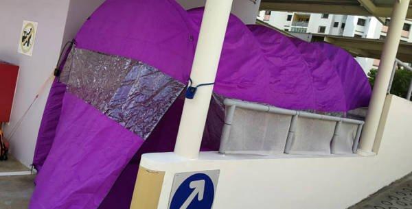 多次被刮花 男子买账篷“罩”车