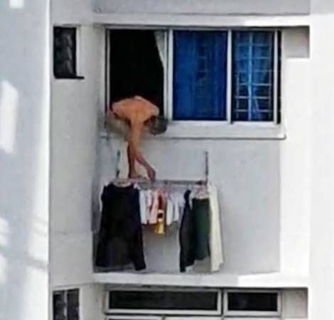 10楼跨窗晒衣吓坏街坊 老伯却说“没事”