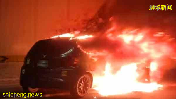 撞隧道起火吓到不会逃 女司机被2路过车主救出