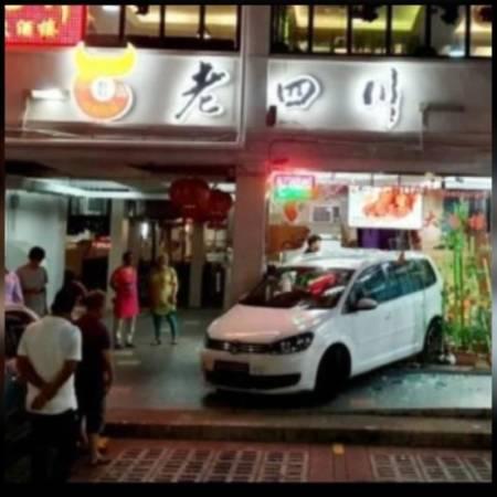 休旅车倒退 撞进餐馆 送餐员手脚敏捷 跳开逃命