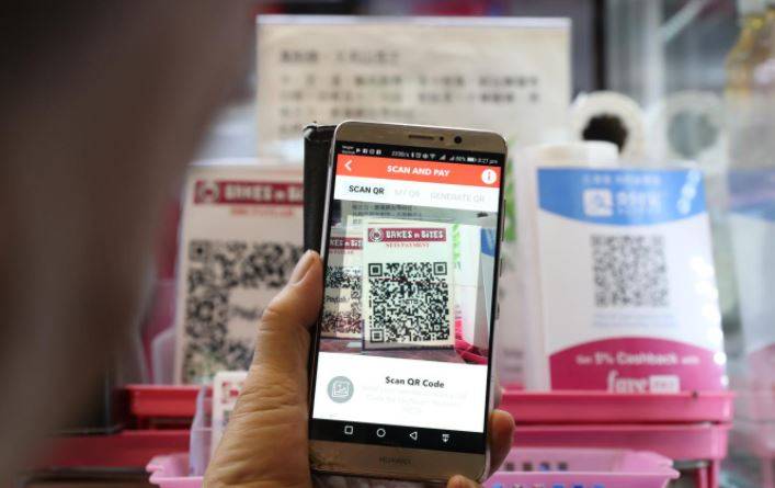 新加坡走入数字化,大多数小贩都已接受电子支付