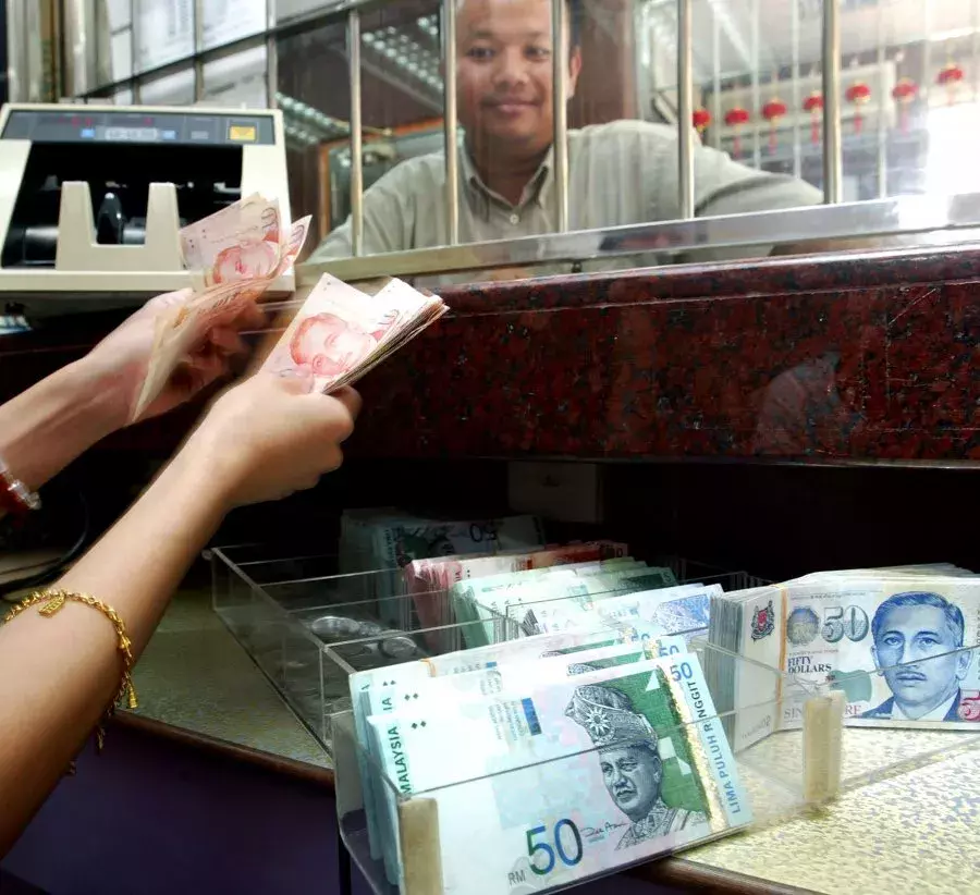 【海外收入被征税】计划出售大马国内产业　大马客工钱留狮城