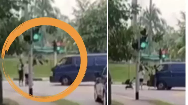 闯红灯差点撞婴儿车 货车司机遭网民谴责