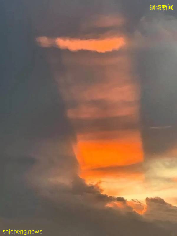 今早,新加坡出现美丽的曙光和彩虹