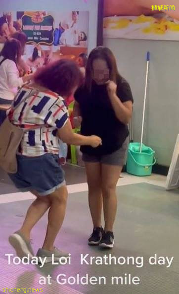 泰国水灯节来到黄金坊？ 女子不戴口罩  忘我起舞