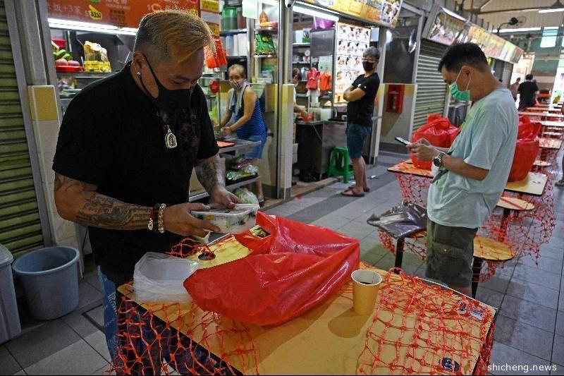 新加坡餐饮业员工‧下周一起必须戴口罩