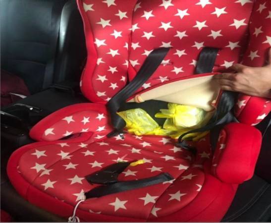 藏儿童安全椅婴儿手推车 新加坡关卡起走私电子烟