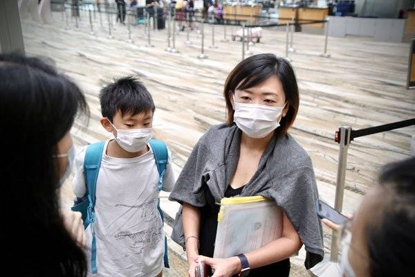 泡泡班机变“普通班机” 狮城10多人照旧飞港