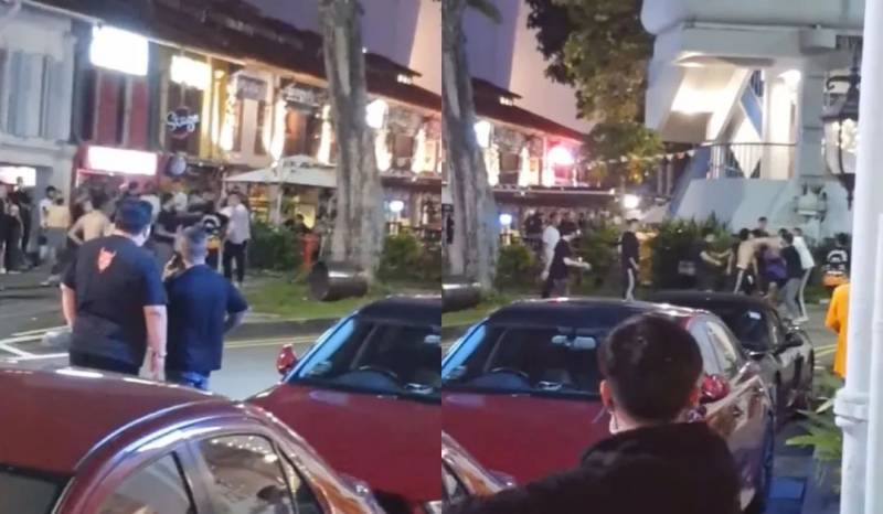 众人当街打群架!焚烧筒盖竟成攻击武器