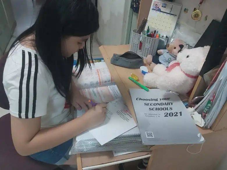 克服学习环境带来的挑战，新加坡小六生永不言弃取得成功