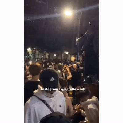 公然違規!新加坡克拉碼頭百人狂歡跨年: 不戴口罩、貼面跳舞!或導致超級傳播