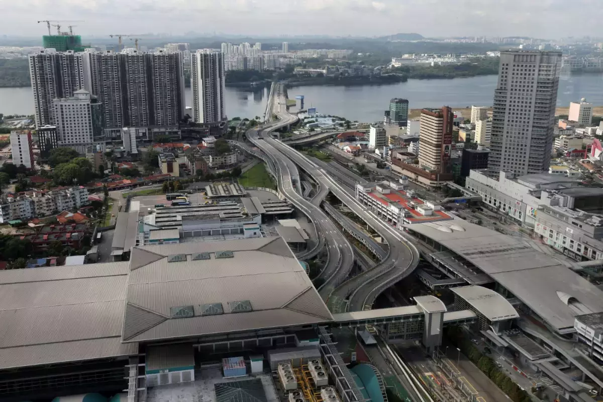 【海外收入被征税】计划出售大马国内产业 大马客工钱留狮城