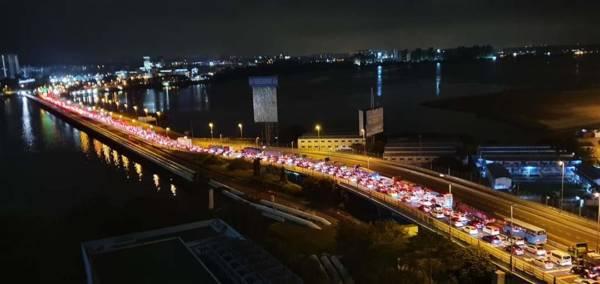 ◤行动管制14天◢冀政府有明确宣布！马劳边涌入狮城 边等“转机”