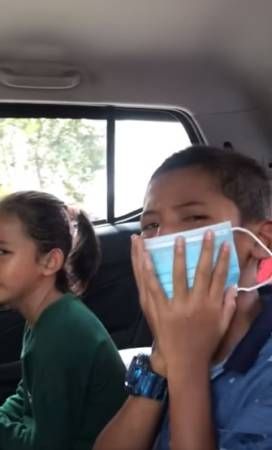 爸爸返新工作 孩子泪眼道别