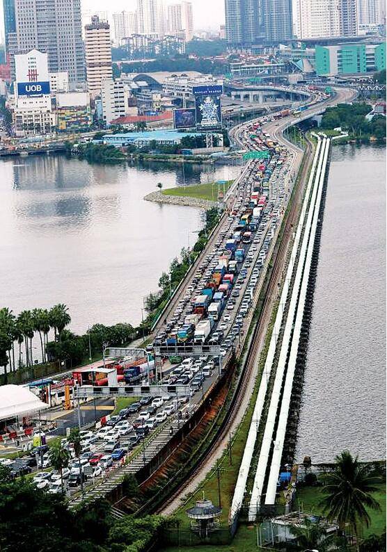 新加坡和疫情回潮的大马将限时放开通勤